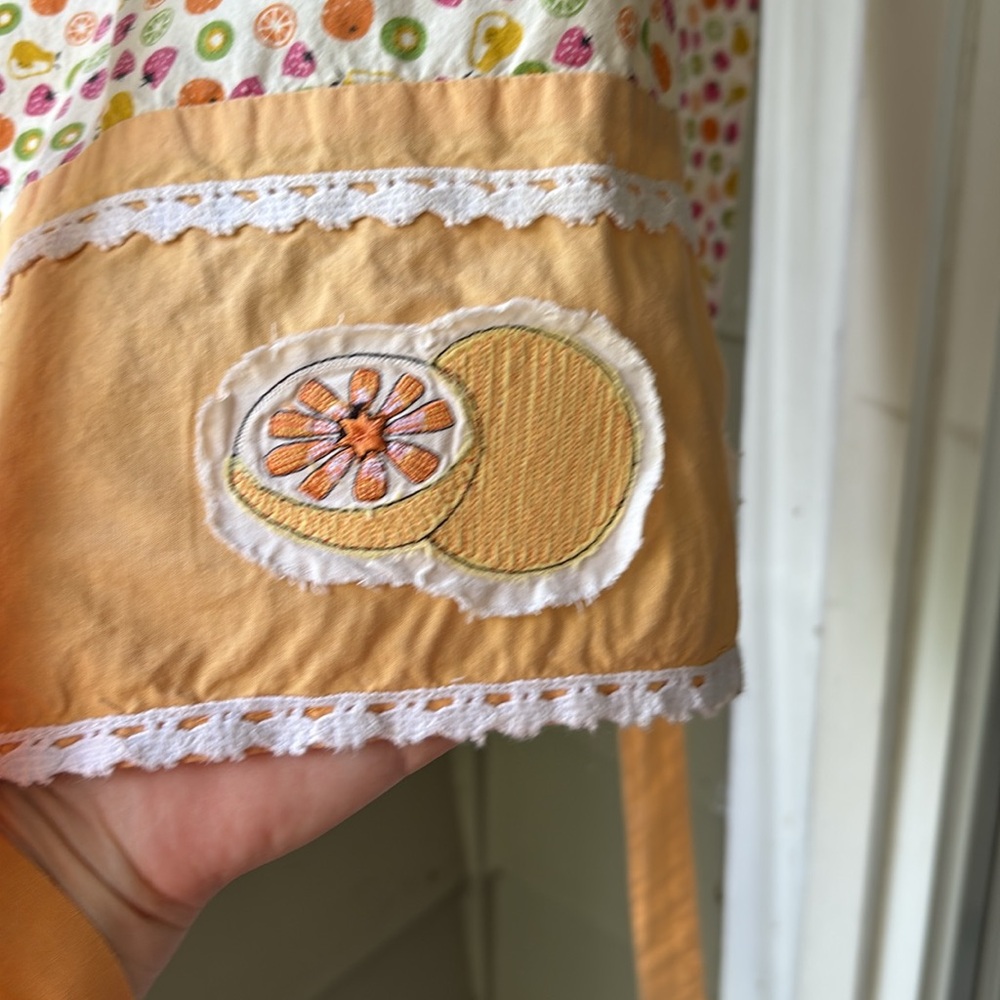 Sur La Table Vtg apron. Colorful Fruit design with “patch” oranges. Pre-loved - Picture 2 of 4